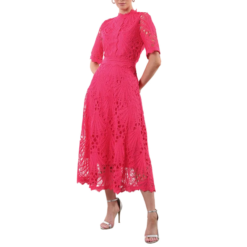 Retro short sleeve solid color dress in pink with cinched waist and flared skirt

