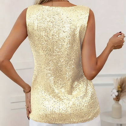 Close-up of gold sequin embellishment detail on sleeveless party top

