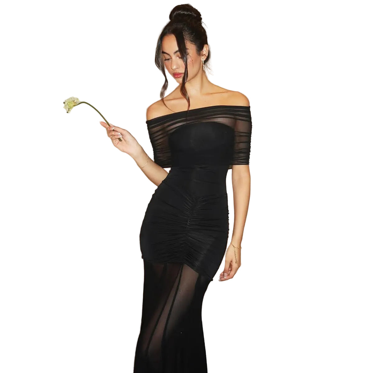 Woman wearing a black off-shoulder dress holding a flower on a white background