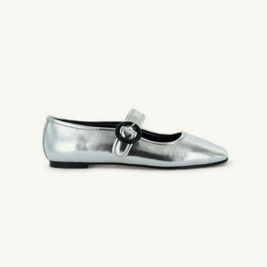 Elle Silver metallic flat shoe with a black heel 