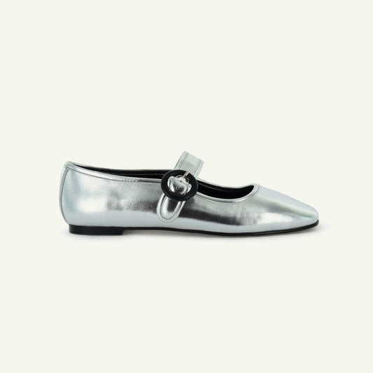 Elle Silver metallic flat shoe with a black heel 