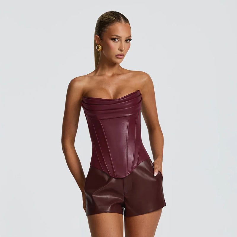 Woman wearing a strapless burgundy leather outfit perfect for clubbing