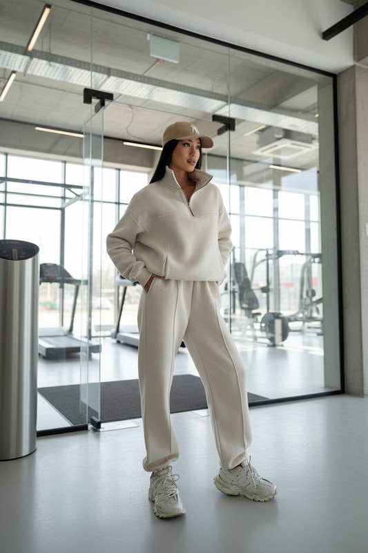 Y2K zip-up contrast tracksuit two-piece set in beige– front view, collage stitch detail and full-length zipper
age sti