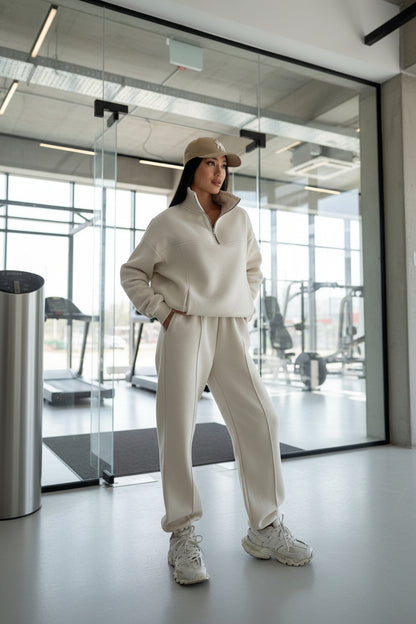 Y2K zip-up contrast tracksuit two-piece set in beige– front view, collage stitch detail and full-length zipper
age sti