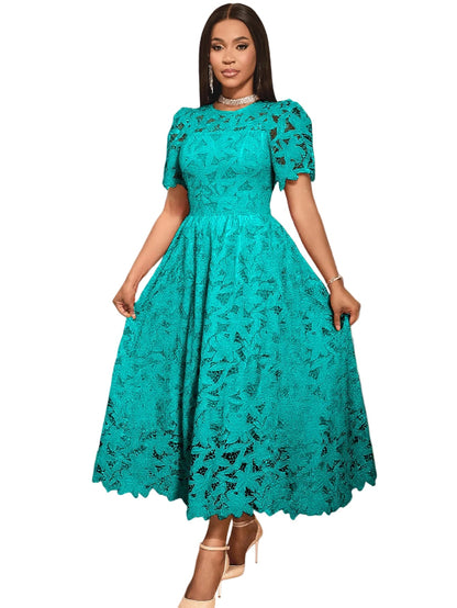 Woman wearing a teal lace dress 