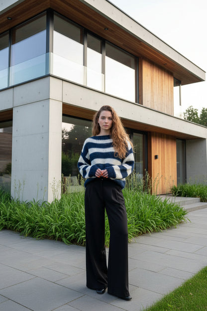 Loose stripe knit pullover in army black and white – front view showing long sleeve and relaxed silhouette
