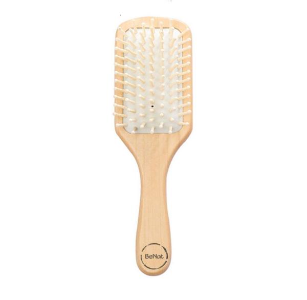 Wooden paddle brush with white bristles 