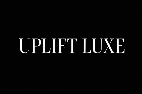 UPLIFT LUXE logo with white text on black background